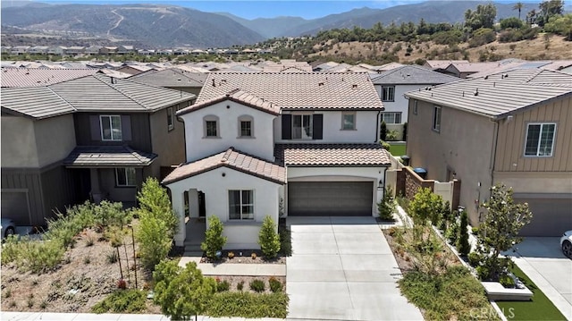 2239 Melogold Way, Corona, CA 92883 - view of front of house featuring a residential view, a tiled roof, stucco siding, concrete driveway, and an attached garage