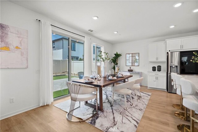 2239 Melogold Way, Corona, CA 92883 - dining room featuring light wood-style floors and recessed lighting