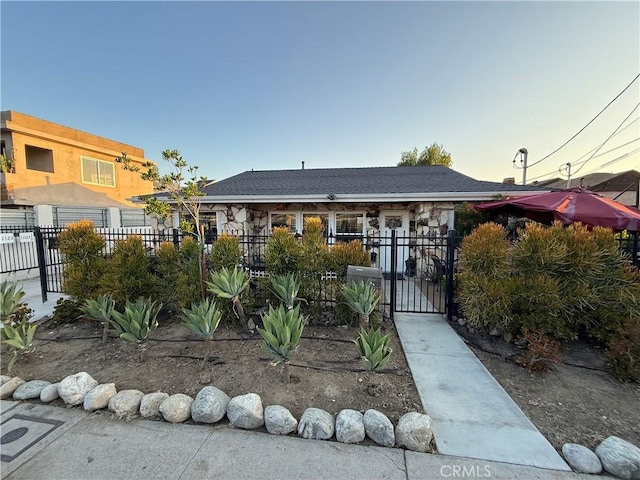 11125 Glenoaks Blvd, Pacoima, CA 91331 - view of front facade with a fenced front yard and a gate