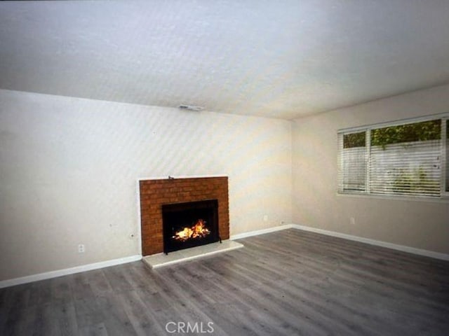 2756 Gallio Ave, Rowland Heights, CA 91748 - unfurnished living room with wood finished floors and a fireplace