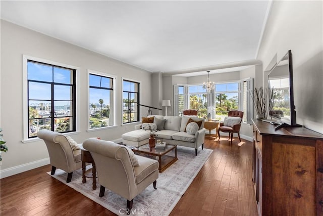 800 E Ocean Blvd Unit 201, Long Beach, CA 90802 - living room featuring a chandelier and dark wood-style flooring