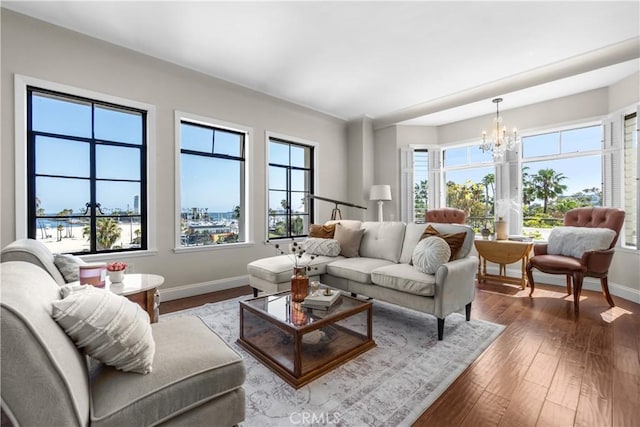 800 E Ocean Blvd Unit 201, Long Beach, CA 90802 - living area featuring a chandelier and dark wood-type flooring