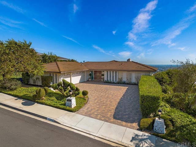 5946 Overlake Ave, Del Cerro, CA 92120 - single story home with an attached garage, a tiled roof, and decorative driveway