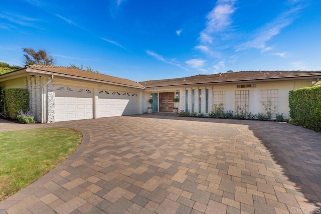 5946 Overlake Ave, Del Cerro, CA 92120 - single story home with decorative driveway, a garage, and stucco siding
