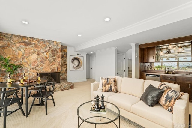 5946 Overlake Ave, Del Cerro, CA 92120 - living area with ornamental molding, bar area, light carpet, recessed lighting, and a stone fireplace
