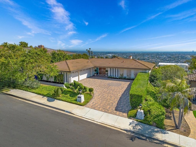 5946 Overlake Ave, Del Cerro, CA 92120 - ranch-style house featuring an attached garage, a tiled roof, and decorative driveway