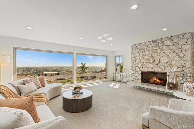 5946 Overlake Ave, Del Cerro, CA 92120 - carpeted living room featuring a stone fireplace and recessed lighting