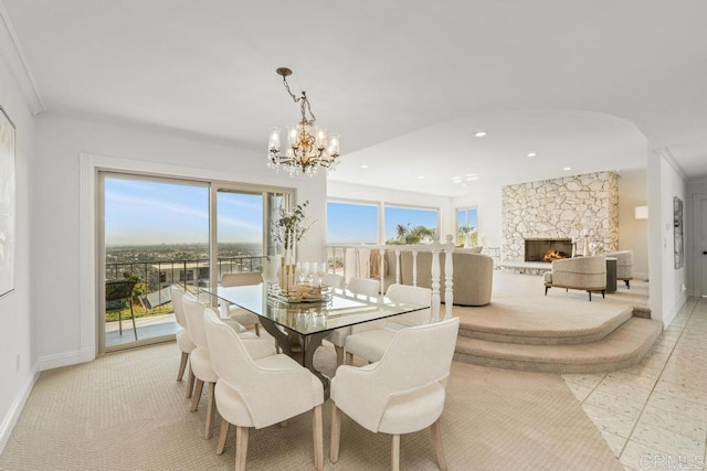 5946 Overlake Ave, Del Cerro, CA 92120 - dining room featuring a chandelier, a stone fireplace, and recessed lighting