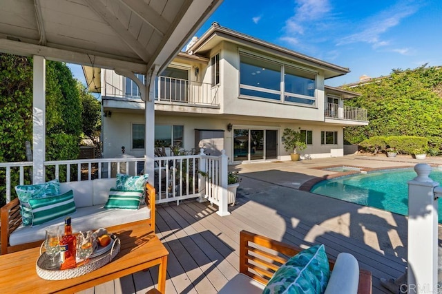 5946 Overlake Ave, Del Cerro, CA 92120 - deck with a patio area, an outdoor hangout area, and a pool with connected hot tub