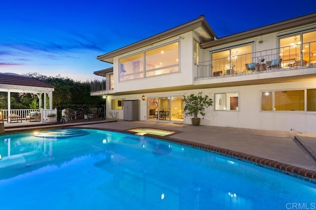5946 Overlake Ave, Del Cerro, CA 92120 - rear view of house with an in-ground hot tub, a gazebo, stucco siding, a balcony, and an outdoor pool