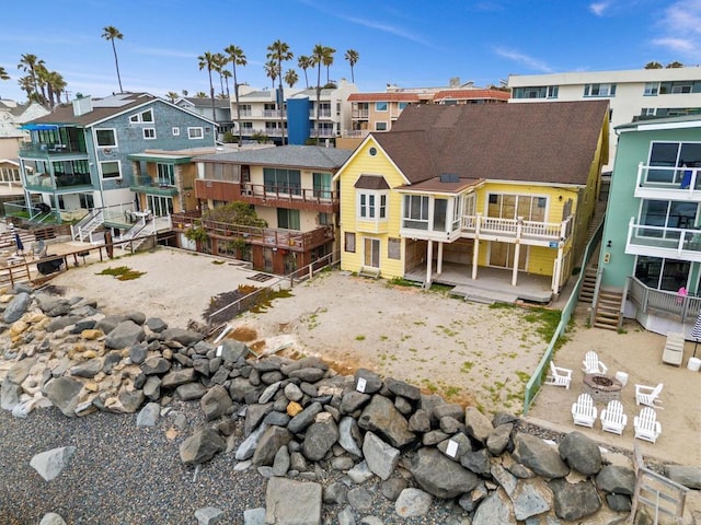 1121 S Pacific St, Oceanside, CA 92054 - rear view of property with a residential view, a patio area, and stairway