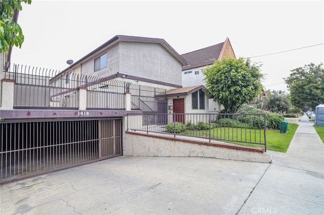 1818 W 145th St Unit 1, Gardena, CA 90249 - view of side of property with a gate