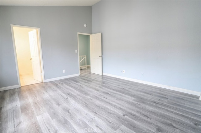 1818 W 145th St Unit 1, Gardena, CA 90249 - unfurnished room featuring high vaulted ceiling and wood finished floors