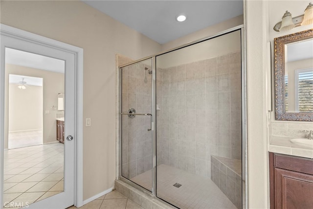29243 Discovery Ridge Dr, Saugus, CA 91390 - bathroom with tile patterned flooring, a shower stall, vanity, and ceiling fan