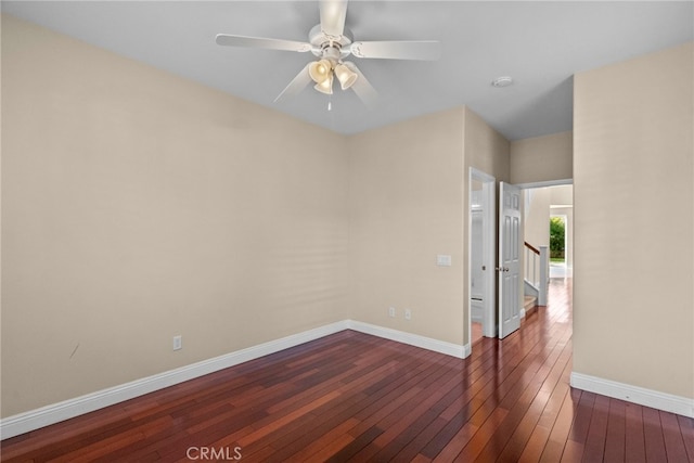 29243 Discovery Ridge Dr, Saugus, CA 91390 - unfurnished room with dark wood-style floors, ceiling fan, and a smoke detector