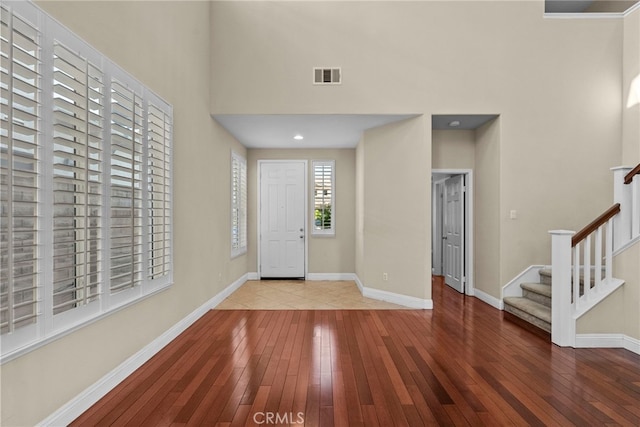 29243 Discovery Ridge Dr, Saugus, CA 91390 - entrance foyer with a high ceiling, hardwood / wood-style floors, and stairway