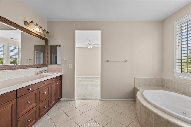 29243 Discovery Ridge Dr, Saugus, CA 91390 - bathroom featuring vanity, a tub with jets, a ceiling fan, and tile patterned flooring