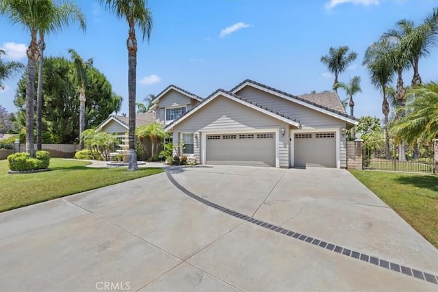10847 Leota Ln, Riverside, CA 92503 - view of front of property with driveway, a garage, and a tile roof