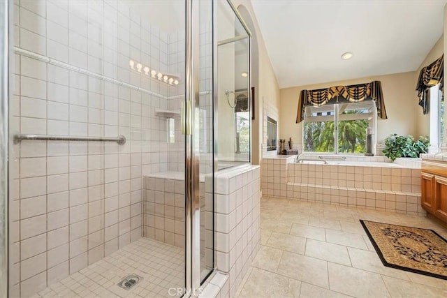 10847 Leota Ln, Riverside, CA 92503 - full bath featuring vanity, a stall shower, tile patterned floors, and a garden tub