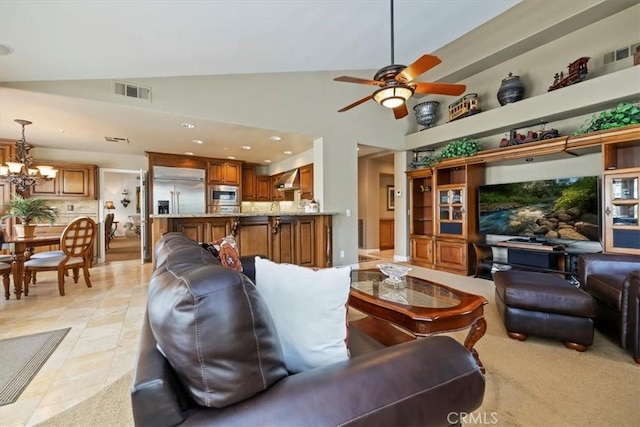 10847 Leota Ln, Riverside, CA 92503 - living room with a ceiling fan, a chandelier, recessed lighting, and high vaulted ceiling