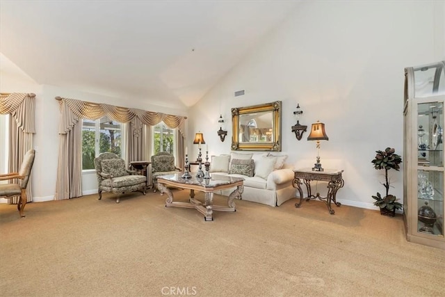 10847 Leota Ln, Riverside, CA 92503 - living area featuring carpet flooring and high vaulted ceiling