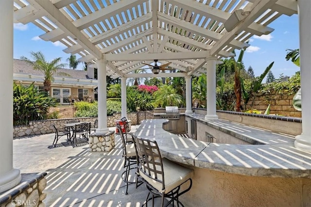 10847 Leota Ln, Riverside, CA 92503 - view of patio / terrace featuring area for grilling, a pergola, and an outdoor bar