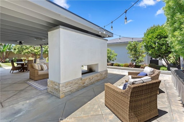 1335 N Vallejo Way, Upland, CA 91786 - view of patio / terrace featuring a multi sided fireplace and outdoor dining area