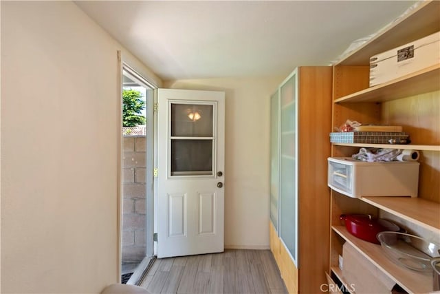 1335 N Vallejo Way, Upland, CA 91786 - doorway to outside featuring light wood-type flooring