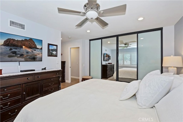 1335 N Vallejo Way, Upland, CA 91786 - bedroom featuring recessed lighting, a closet, light wood-style flooring, and a ceiling fan
