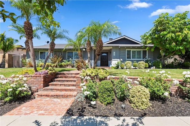1335 N Vallejo Way, Upland, CA 91786 - ranch-style home with a front lawn