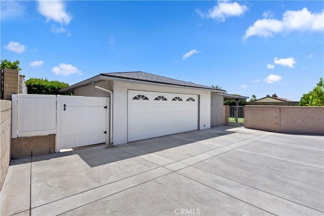 1335 N Vallejo Way, Upland, CA 91786 - garage with a gate and driveway