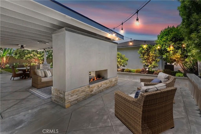 1335 N Vallejo Way, Upland, CA 91786 - view of patio featuring a multi sided fireplace and outdoor dining area