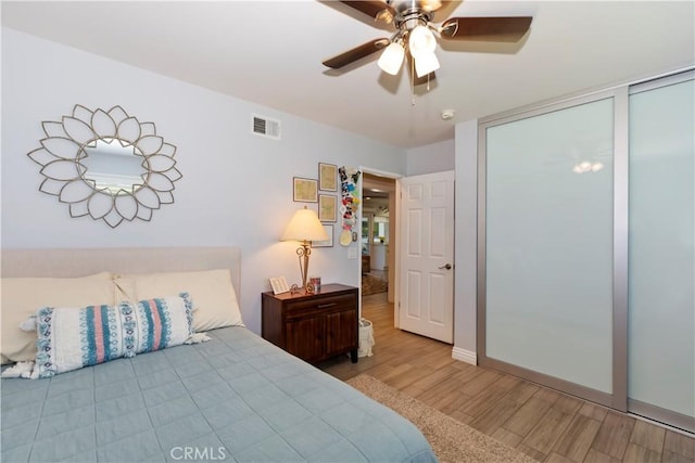 1335 N Vallejo Way, Upland, CA 91786 - bedroom with wood finished floors and ceiling fan