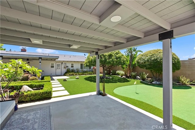 1335 N Vallejo Way, Upland, CA 91786 - fenced backyard with a putting area and a patio area