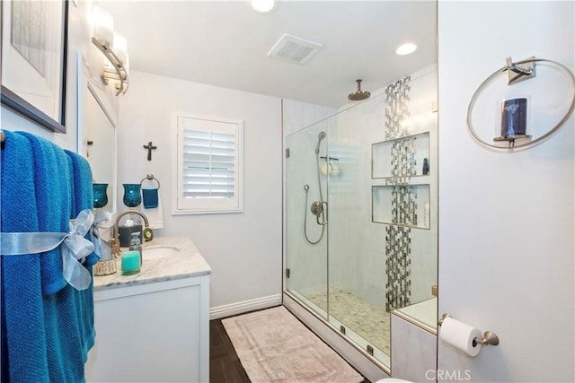 1335 N Vallejo Way, Upland, CA 91786 - full bathroom with a stall shower, vanity, recessed lighting, and wood finished floors