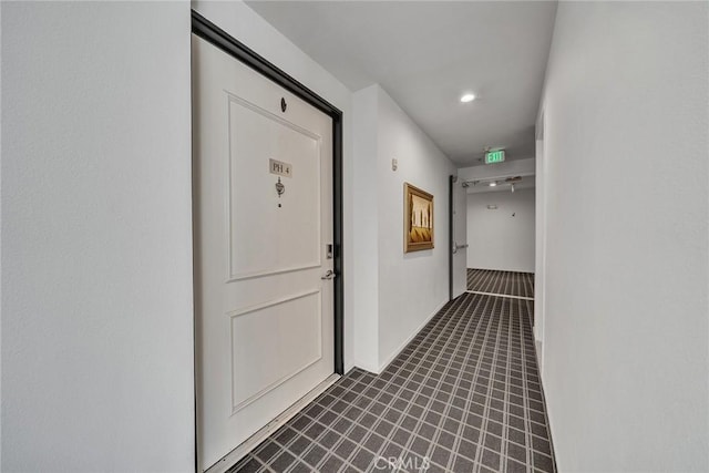 625 S Berendo St Unit 604, Los Angeles, CA 90005 - hallway featuring recessed lighting and dark tile patterned flooring