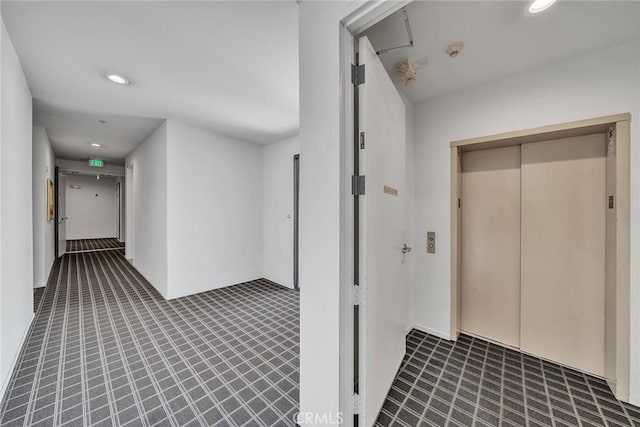 625 S Berendo St Unit 604, Los Angeles, CA 90005 - hallway featuring elevator and recessed lighting