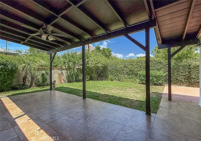 6706 Melvin Ave, Reseda, CA 91335 - fenced backyard featuring a ceiling fan and a patio area