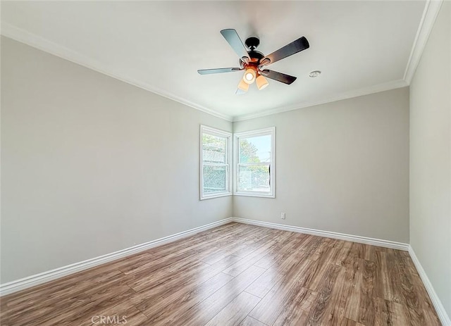 6706 Melvin Ave, Reseda, CA 91335 - unfurnished room with wood finished floors, ornamental molding, and a ceiling fan