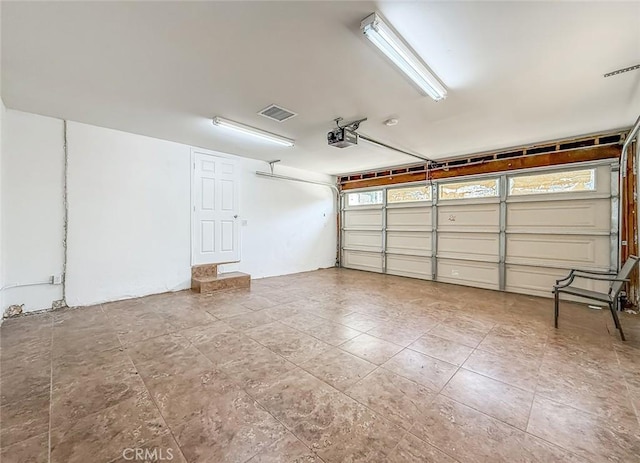 6706 Melvin Ave, Reseda, CA 91335 - garage featuring a garage door opener