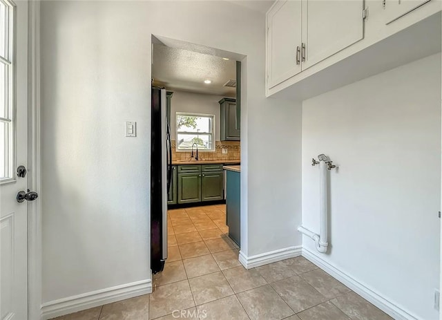 6706 Melvin Ave, Reseda, CA 91335 - corridor featuring light tile patterned floors and a textured ceiling
