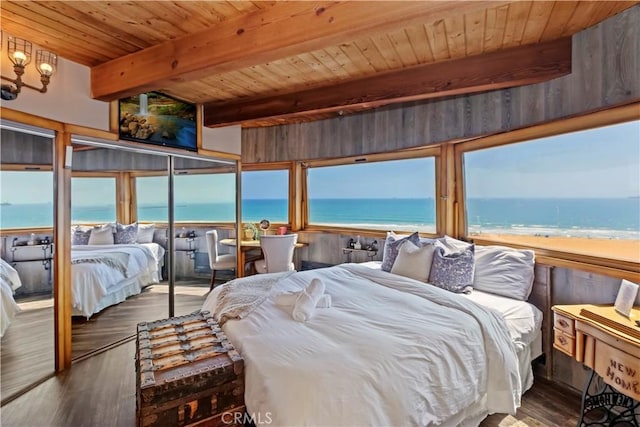 1 Anderson St, Seal Beach, CA 90743 - bedroom with view of water and beach, a wood ceiling with exposed beams, wood finished floors, and multiple windows