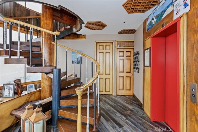 1 Anderson St, Seal Beach, CA 90743 - foyer featuring stairs, dark wood-type flooring, and elevator