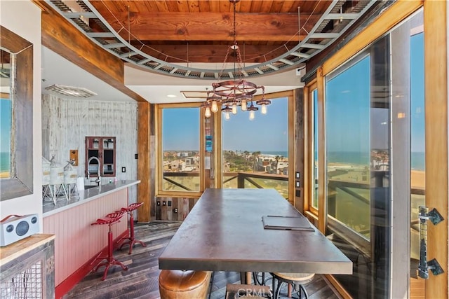 1 Anderson St, Seal Beach, CA 90743 - dining room featuring dark wood-style flooring and a wooden ceiling with exposed beams