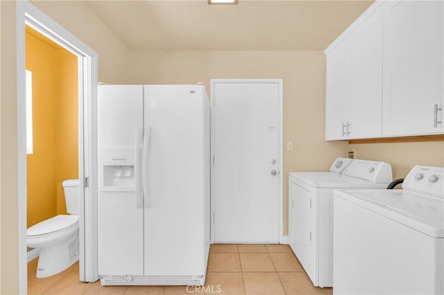 20468 College Blvd, Riverside, CA 92507 - laundry area with light tile patterned flooring, cabinet space, and washing machine and dryer