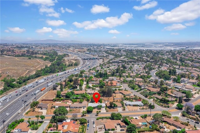 20468 College Blvd, Riverside, CA 92507 - aerial perspective of suburban area with a main thoroughfare and a mountain backdrop