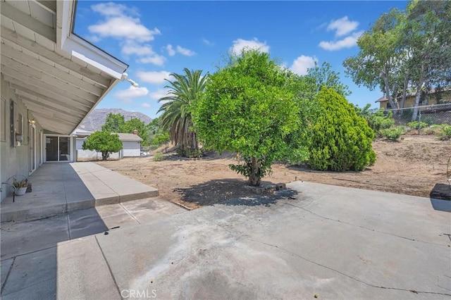 20468 College Blvd, Riverside, CA 92507 - view of patio featuring concrete driveway