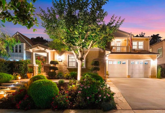 3474 Camino Cereza, Carlsbad, CA 92009 - view of front facade featuring concrete driveway, an attached garage, and a balcony