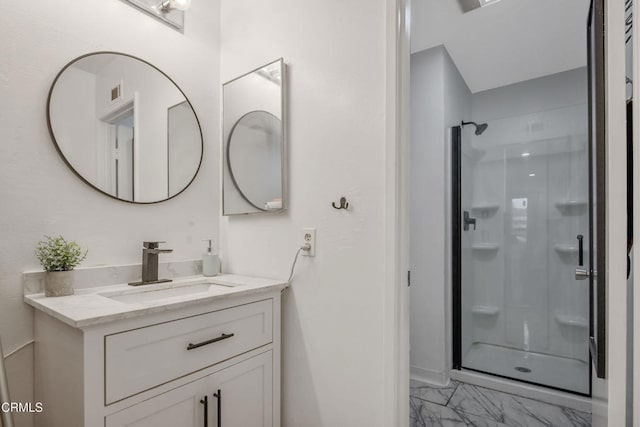 502 Holly Ave, Oxnard, CA 93036 - bathroom featuring a stall shower, marble finish flooring, and vanity