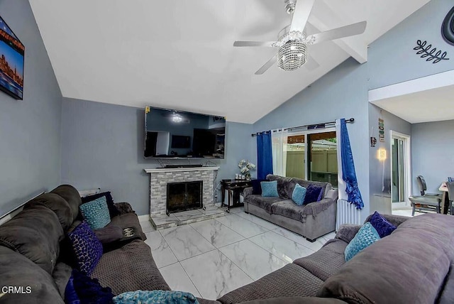 502 Holly Ave, Oxnard, CA 93036 - living area featuring ceiling fan, marble look tiles, a fireplace, beam ceiling, and high vaulted ceiling